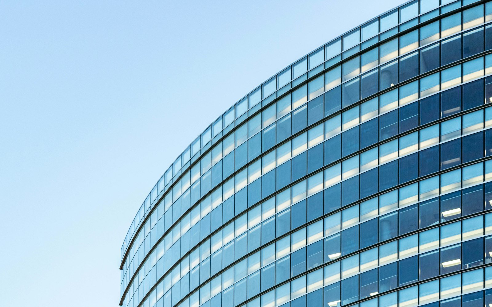 A curved glass office building